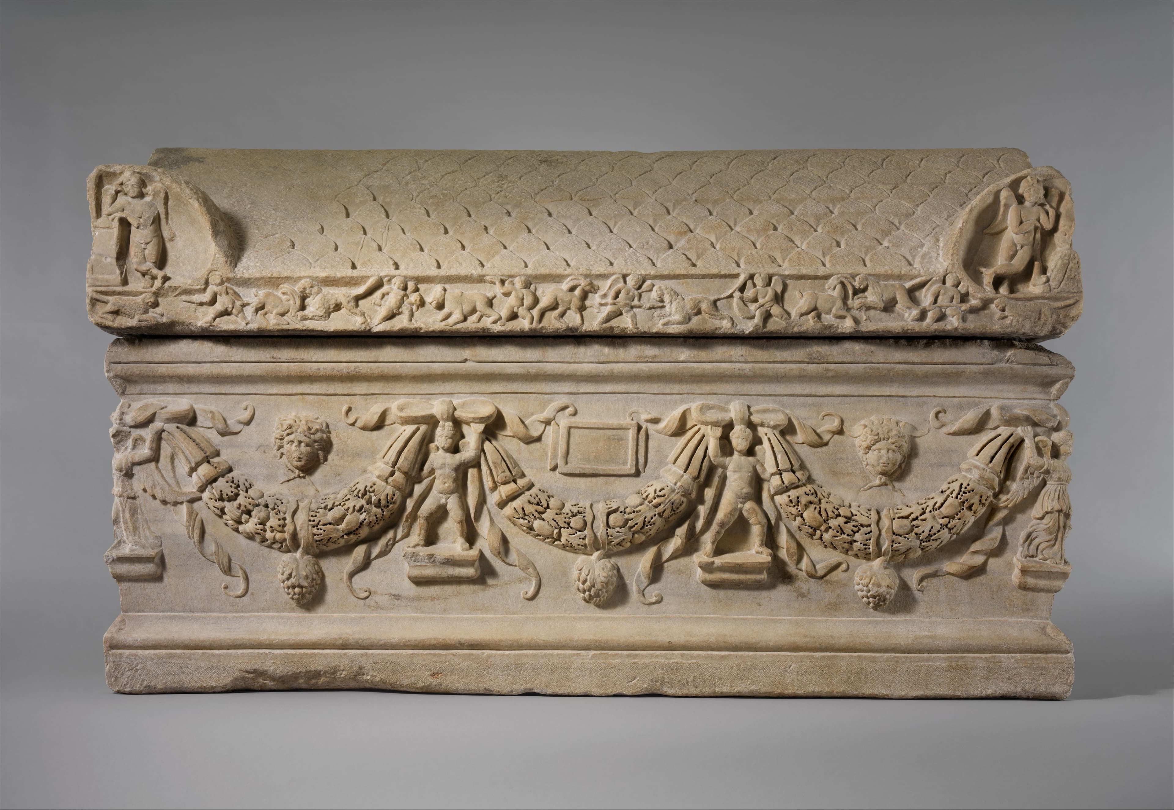 Marble sarcophagus with garlands by unknown artist, ca. 200–225 CE.