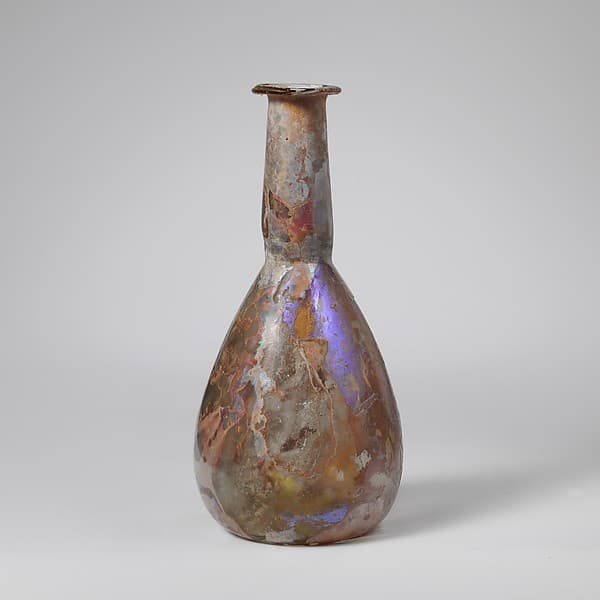 Glass perfume bottle by unknown artist, 2nd–3rd century CE.