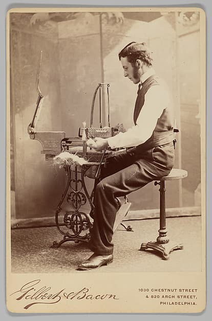 [Man Operating Brush Drawing Machine] by Gilbert & Bacon, 1880s.
